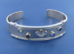 Gold Bangle set with Precious and Semi-Precious Gemstones